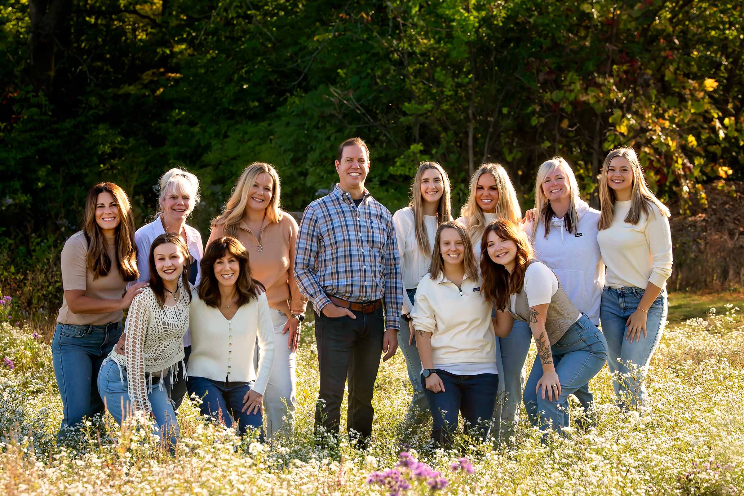 Full Ferri Orthodontics team photo in field